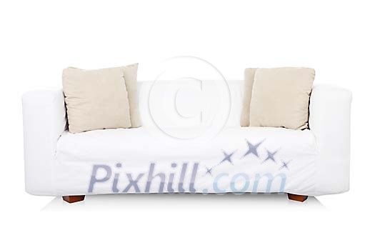 Isolated white sofa with beige pillows
