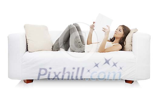 Isolated woman reading on the sofa Isolated woman reading on the sofa