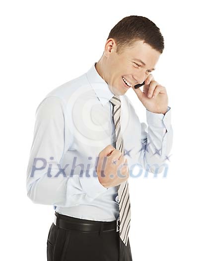 Isolated businessman getting good news over the phone Isolated businessman getting good news over the phone