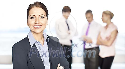 Businesswoman with her associates Businesswoman with her associates