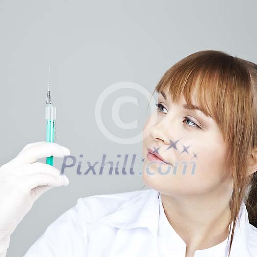 Female nurse with a syringe