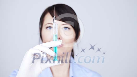 Female nurse with a syringe Female nurse with a syringe