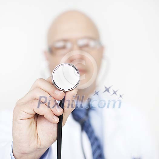 Doctor holding a stetoscope Doctor holding a stetoscope