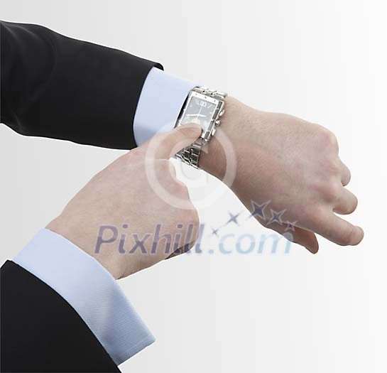 Male pointing to his watch Male pointing to his watch
