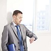 Businessman looking at his watch
