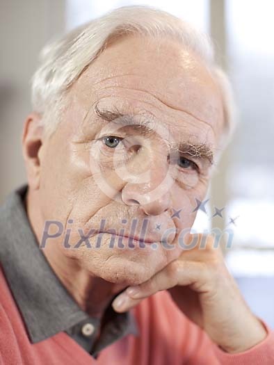 Face portrairt of a serious senior man Face portrairt of a serious senior man