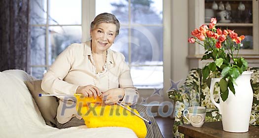 Senior woman knitting at home Senior woman knitting at home