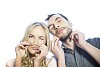 Man and woman making moustache out of womans hair