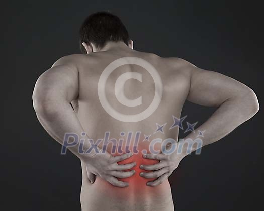 Man holding his hurting back Man holding his hurting back