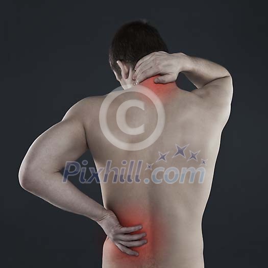 Man touching his sore neck and back Man touching his sore neck and back