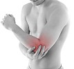 Man holding his sore elbow