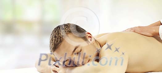 Man being massaged in the spa Man being massaged in the spa