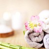 Towels with a flower in the spa