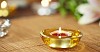 Burning candle on the bamboo rug