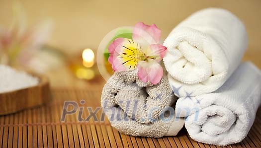 Towels with a flower in the spa Towels with a flower in the spa
