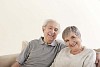 Older couple sitting on the sofa