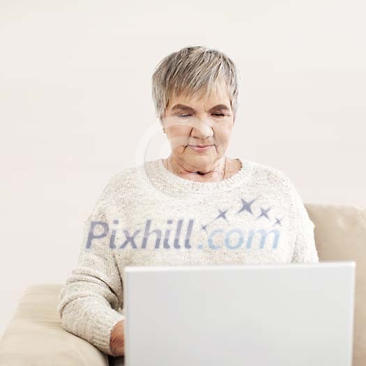 Older woman with a laptop Older woman with a laptop