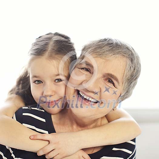 Girl hugging her granny Girl hugging her granny