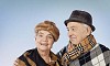 Older couple dressed to go outside