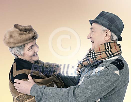 Senior couple about to hug Senior couple about to hug