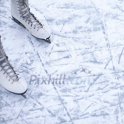 Skater maksing new tracks on ice Skater maksing new tracks on ice