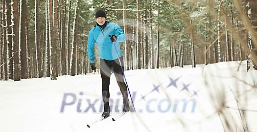 Man skiing in the forest Man skiing in the forest
