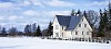 House by the snowy field