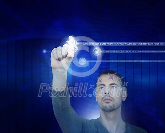 Male working on a touchscreen Male working on a touchscreen