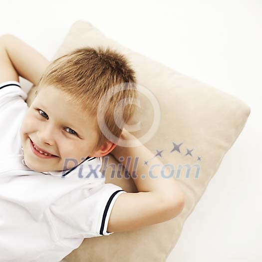 Small boy resting on the pillow Small boy resting on the pillow