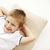 Small boy resting on the pillow