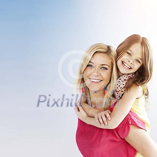 Smiling girl on her mothers back Smiling girl on her mothers back