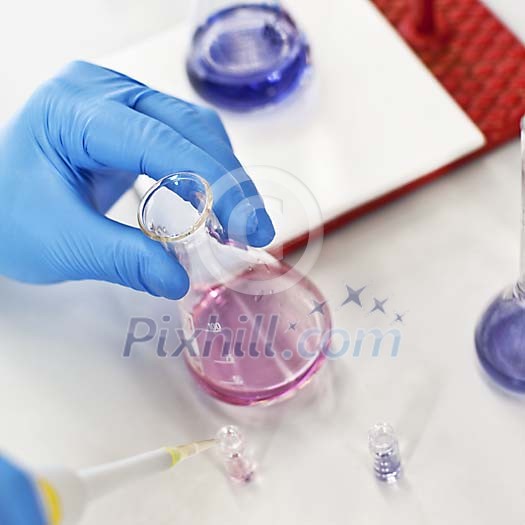 Scientist testing in the laboratory Scientist testing in the laboratory