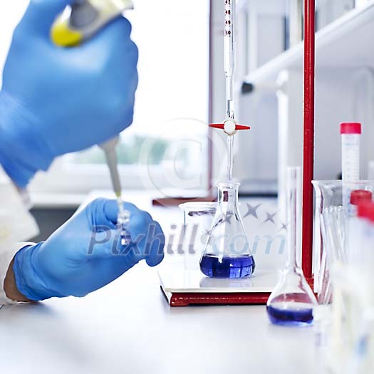 Scientist testing in the laboratory Scientist testing in the laboratory