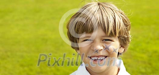 Boy smiling to the camera Boy smiling to the camera