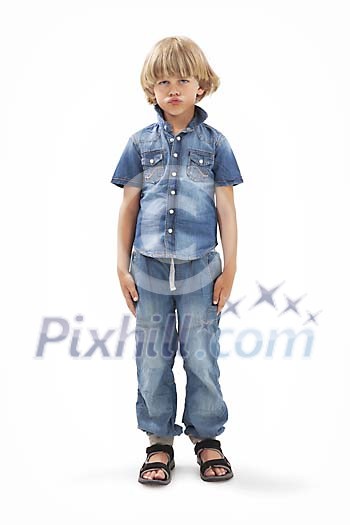 Isolated unhappy looking boy Isolated unhappy looking boy