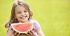 Girl with a slice of watermelon