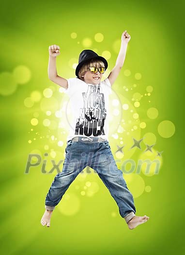 Cool looking boy on a green background Cool looking boy on a green background