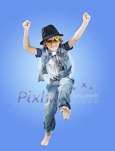 Young boy jumping in the air Young boy jumping in the air