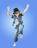 Young boy jumping in the air