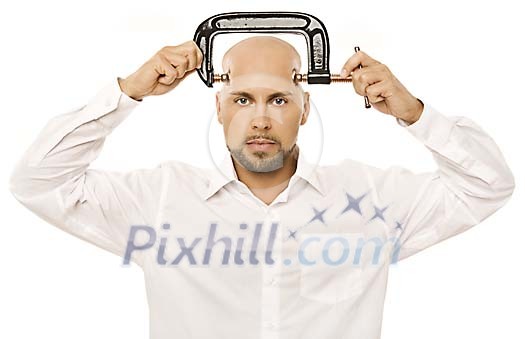Man tightening his head with a clamp Man tightening his head with a clamp