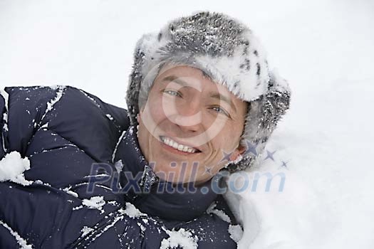 Man lying in the snow Man lying in the snow