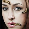 Worms crawling on a womans face