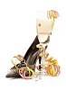 Isolated high heel shoe with a champagne glass and serpentine
