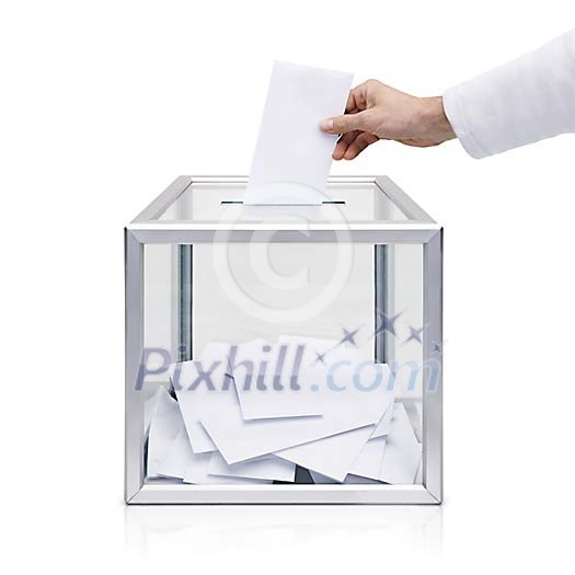 Hand placing the voting slip in to a voting box Hand placing the voting slip in to a voting box