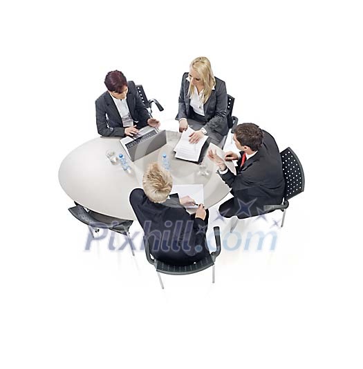 Business meeting around table shot from above Business meeting around table shot from above