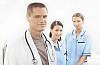 Half body portrait of male doctor and two female nurses