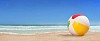 Lonely beach ball on the beach panorama