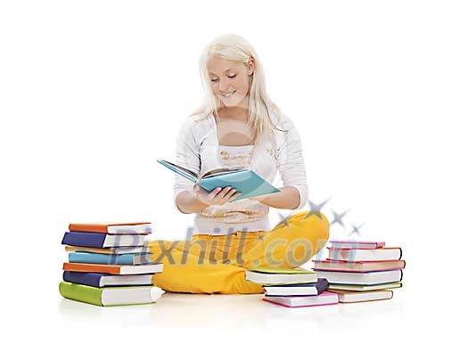 Girl sitting on floor surrounded by piles of books Girl sitting on floor surrounded by piles of books