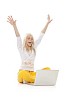 Blonde girl cheering behind a laptop