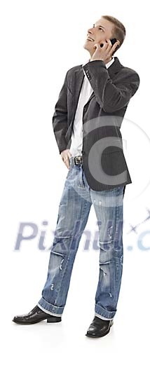 Standing man having phone call (clipping path included) Standing man having phone call (clipping path included)